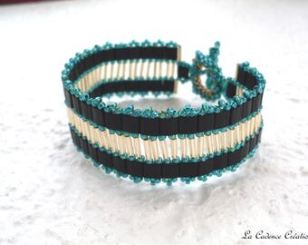 flat black, seed beads Golden tubes and iridescent green seed beads bracelet