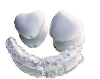 White ceramic and glass lampwork beads