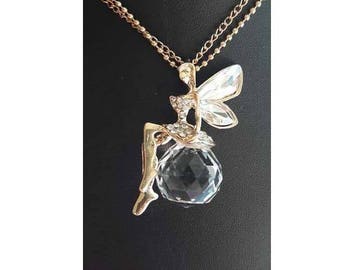 A pretty golden Elf faceted cubic zirconia crystal ball necklace