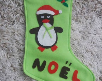 Green Christmas Santa sock for children. Christmas decoration.