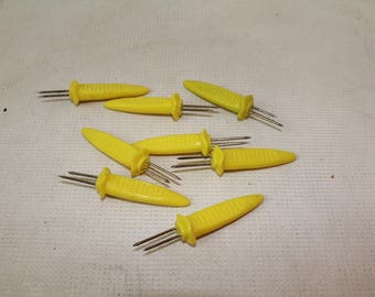 lot of 8 vintage yellow plastic corn on the cob holders