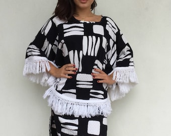 Chic 60s black and white fringed poncho-esque dress
