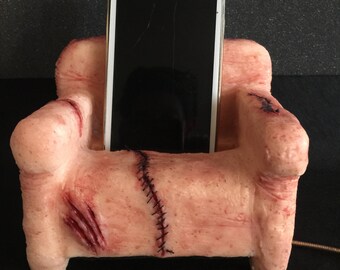 Poltrona Poggia telefono pelle umana