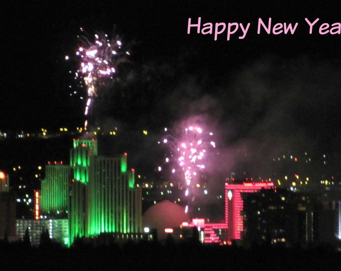 HAPPY NEW YEAR Photo Greeting Card featuring fireworks after dark over Reno, Nevada, plus coordinating envelope