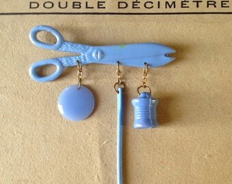 Amazing Celluloid 1930s brooch - Sewing necessary scissors, button, needle and spool of thread - From thirties