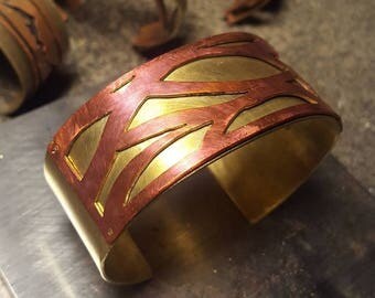 Energy cuff, copper and brass