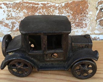 cast iron cars and trucks