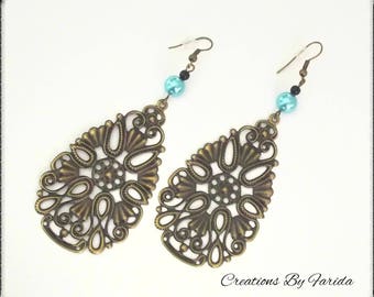 These bronze Teardrop filigree earrings and beads turquoise/black