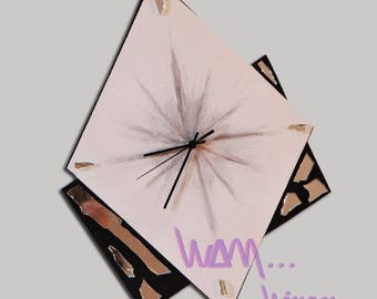 black and white clock decorated with broken mirror