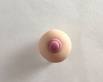 Boob brooch