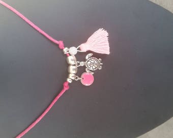 The Choker necklace with tassel and charms