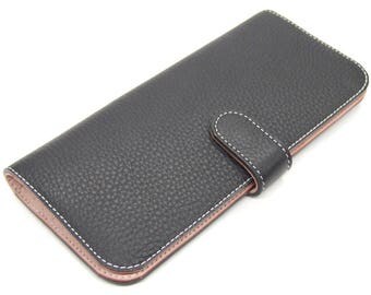 Navy leather clutch purse with pink inner, 12 card slots and large zip pocket