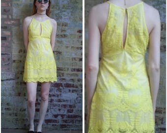 Sheer mesh embroidered peekaboo mini dress