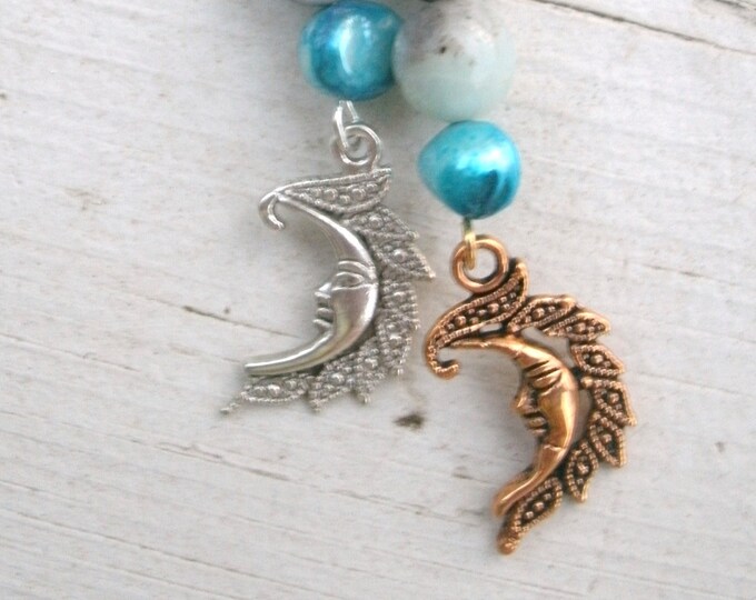 Gold and Silver Moon Earrings, one is silver one is gold, blue freshwater pearl beads, Amazonite, lava rock, crystal beads, gold & silver