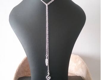 Silver necklace, lariat necklace with leaf and snake charms.