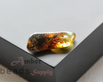 Baltic amber stone. Natural amber piece. Green amber color. Polished amber. 2520/6