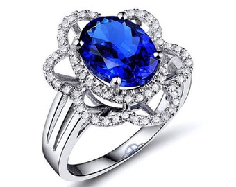 Tanzanian Sapphire and Diamond Halo Ring in White Gold Size 6