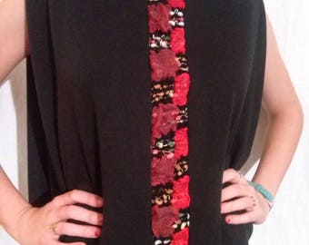 In the shape of cape Black sleeveless blouse