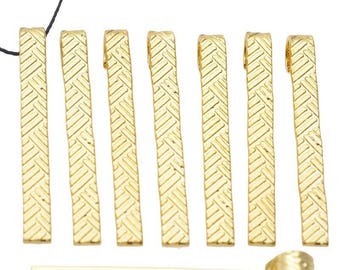 Set of ten ± 40 decorated metal pendants/charms x 4, 5mm (eye ± 4mm)