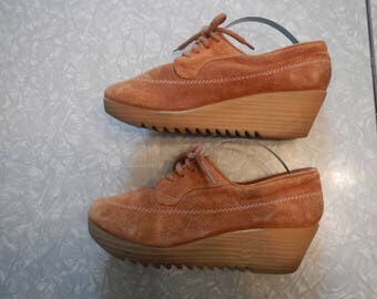 orange and tan shoes