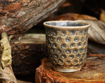 Stoneware Cup with acorn imprints in smooth matte glaze