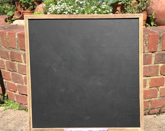 Large chalkoard or blackboard with chalk tray