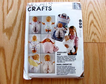 Vintage 1994 Rock A Bye Baby Pattern by McCall's Crafts, includes Pattern for Clothes, Hooded Towel, Diaper Bag and Doll Carrier
