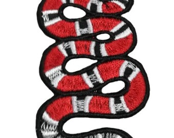gucci like the shirts with the snakes on them