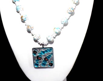 White and blue beaded necklace with glass enamelled pendant