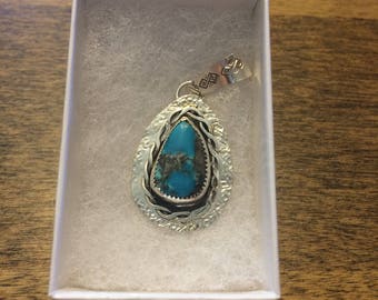 Morenci Turquoise Pendant Wrapped In Sterling Silver