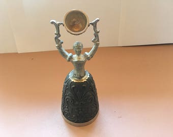 Pewter woman figurine with a burden - OR ?