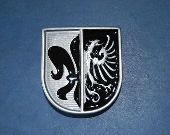 Nice loop for belt, grey and Black colored metal.
