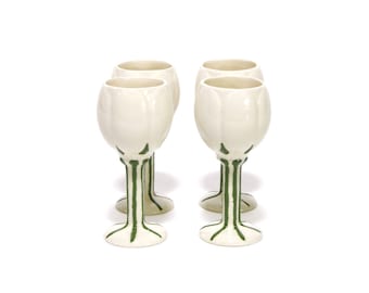 White tulip shaped aperitif glasses