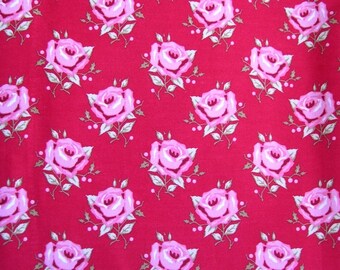 90 cm of Tilda fabric 100% cotton patterned with pink flowers on red background