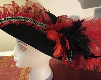 Black wool tricorn with red ruffles and black/gold trim