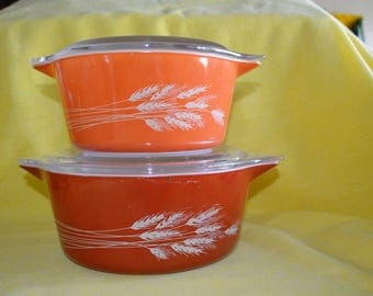 Vintage Pyrex casserole dishes with lids Autumn Harvest Wheat pattern set of two Vintage Pyrex Casseroles with lids Burnt orange and rust