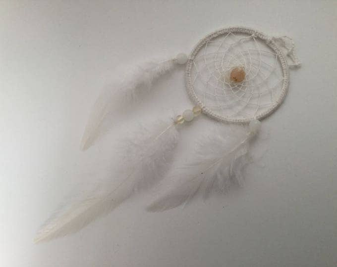 Beautiful dream catcher with white glass beads