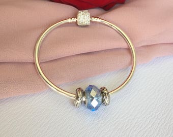 Ring rhinestone clasp with faceted charm held by two stoppers