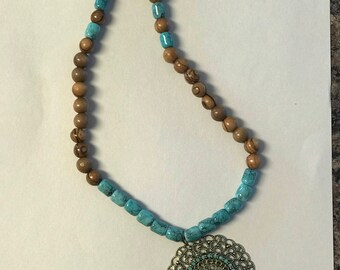 Turquoise and olivewood necklaces with pendant