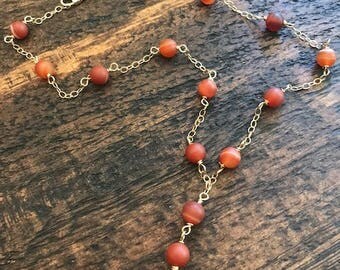 agate lariat style necklace with flower pendant