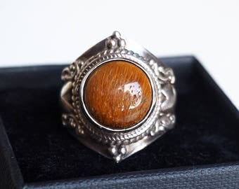 Pretty Nepalese ornamental 925 sterling silver ring and Tiger eye.