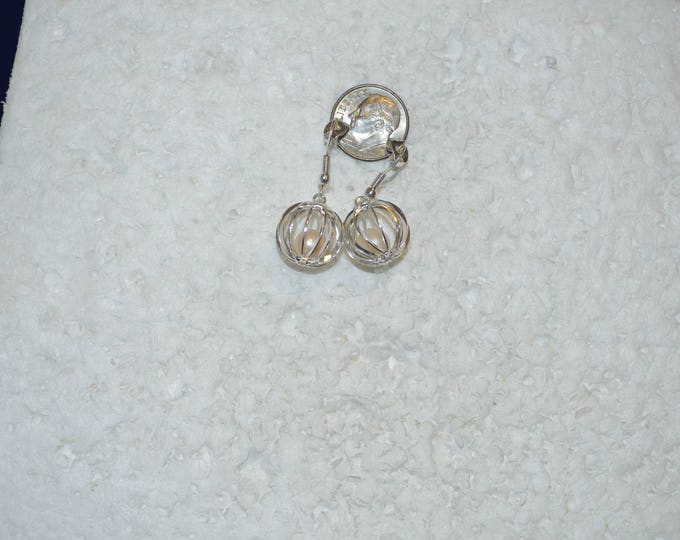 Pearls in a Cage, 7mm Round, not Drilled, Natural, Set in a Silver Plated Cage E1087