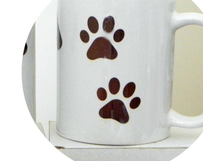 YEAR OF DOG Mug Gift; 10 oz white ceramic mug created by Pam Ponsart with front and back design featuring a Dog's face and 2 paws