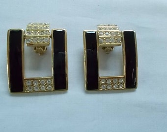 Gold Tone Black and Rhinestone Clip Earrings. (668)