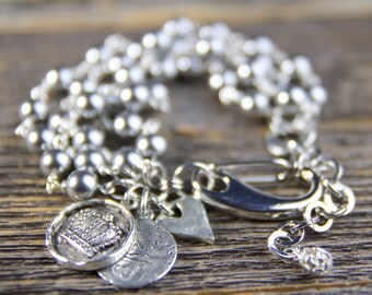 Pearl & Charm Bracelet, Grace Kelly, Rear Window, Multi Strand Pearl Bracelet, Silver Coin Jewelry, Charm Bracelet, Jewelry Trends 2017