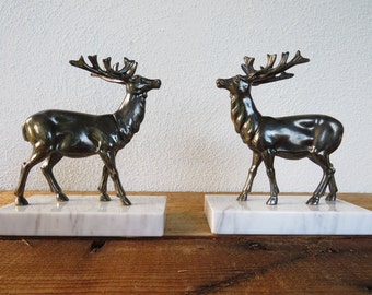 deco red enamel spelter on marble bookends