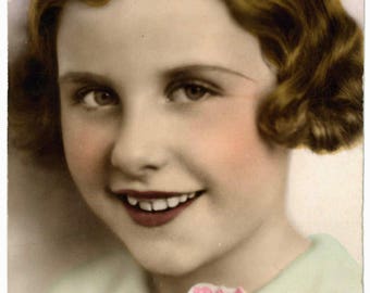 Vintage French birthday postcard, deco style, young girl, wavy bob, appealing smile, all made up, flowers, old hand coloured card, PC Paris