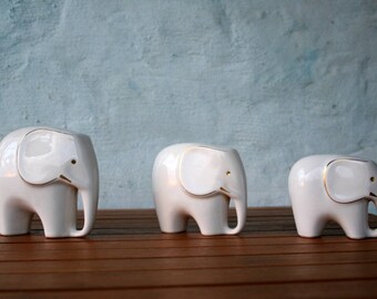 white porcelain elephants