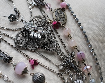 Antique silver (possibly sterling) filigree shoe-clip, antique pink glass rosary beads and rhinestone multi-strand necklace