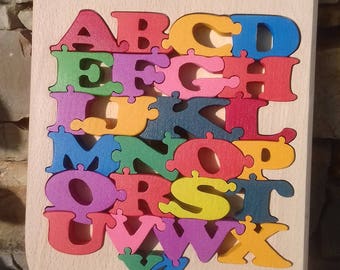 Puzzle comes in a storage coffert solid wooden alphabet